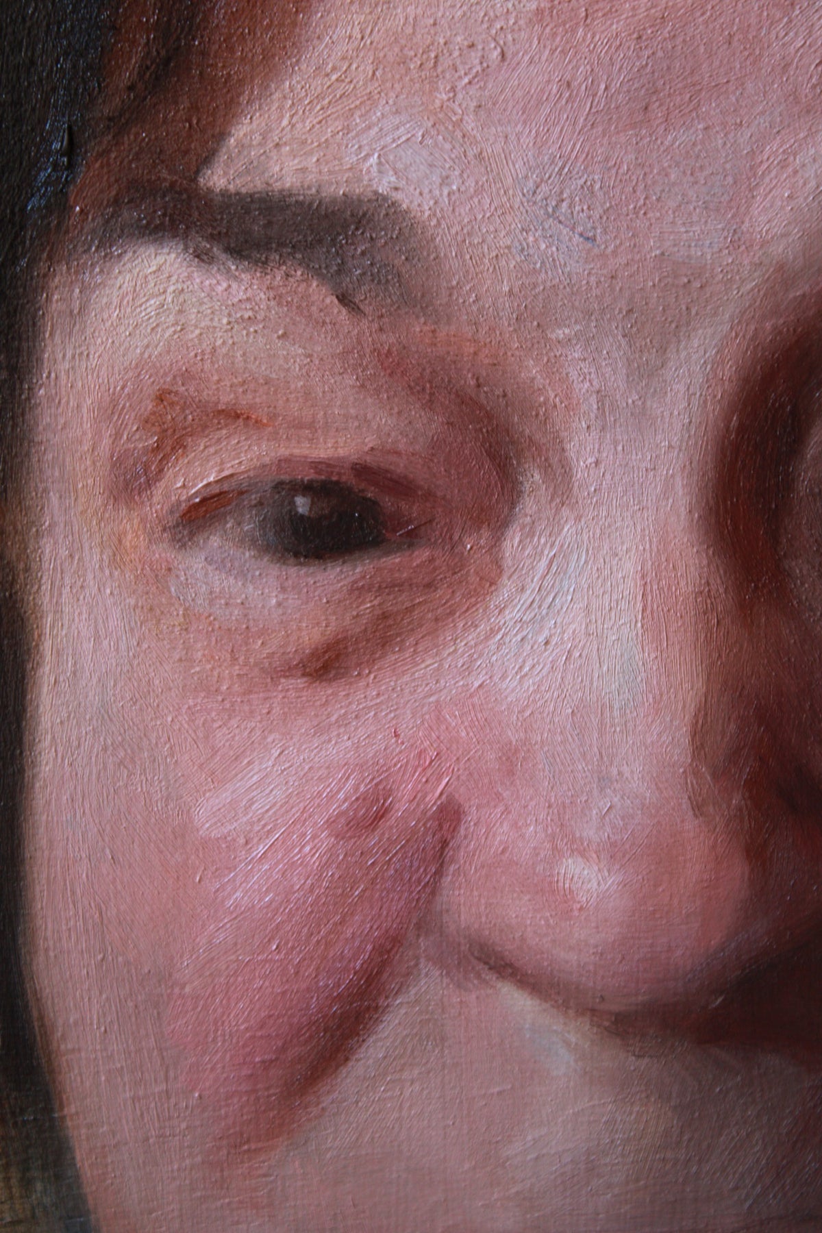Close-up detail of a painted portrait showing part of a person's face with pink skin tones, dark hair, and a visible eye rendered in painterly brushstrokes.